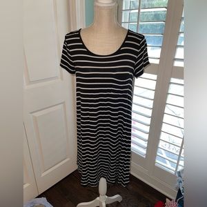 Mission t-shirt style shirt dress, Black & white strips w/ front left pocket.